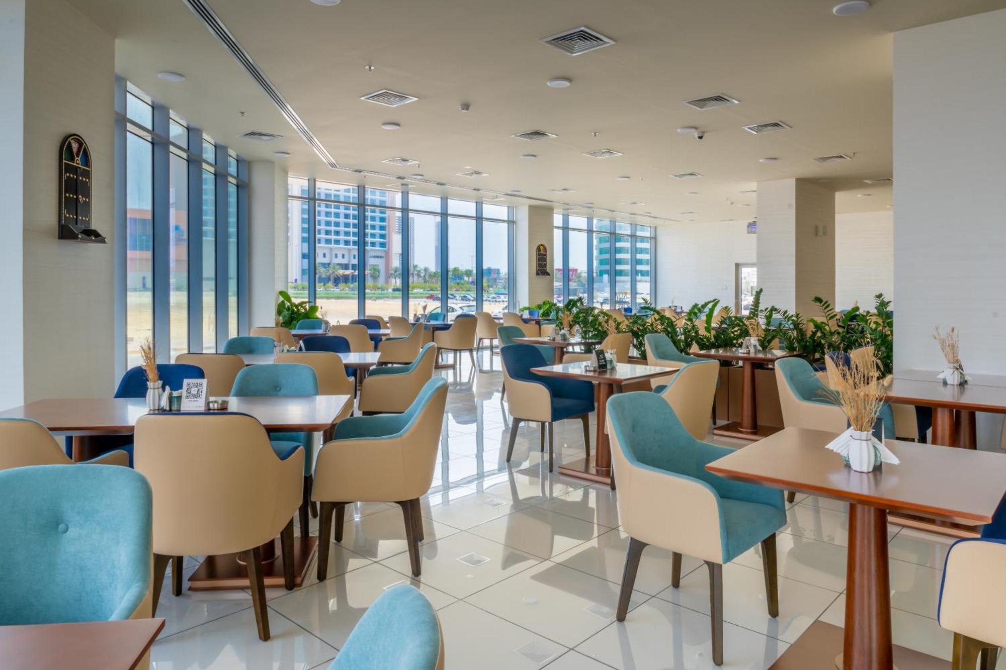 S Plaza Suites Hotel Seef Kültér fotó